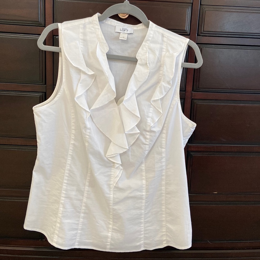 Loft white sleeveless blouse in size 14 with side zipper.